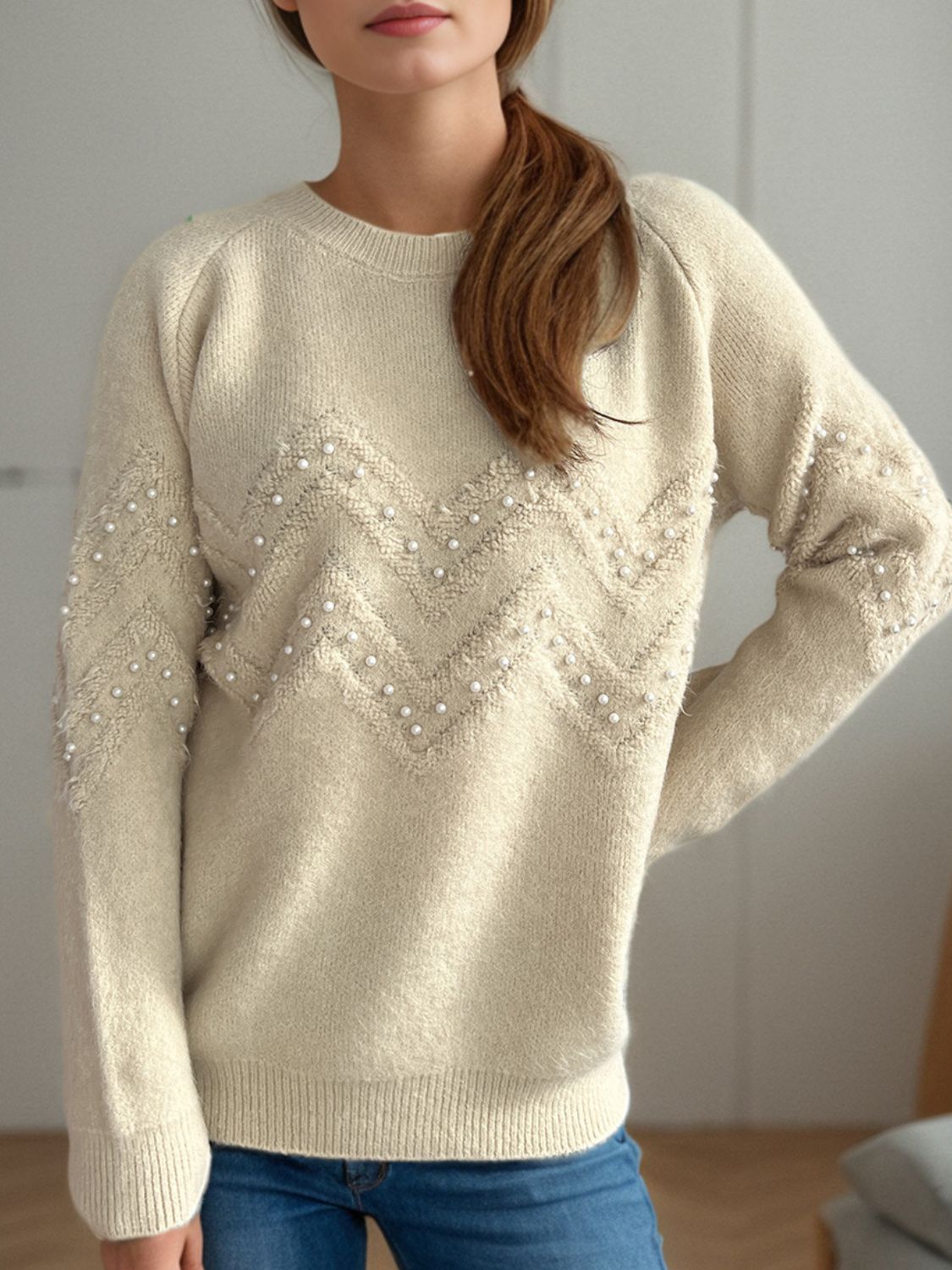 Eleganter Pullover mit Perlendetails