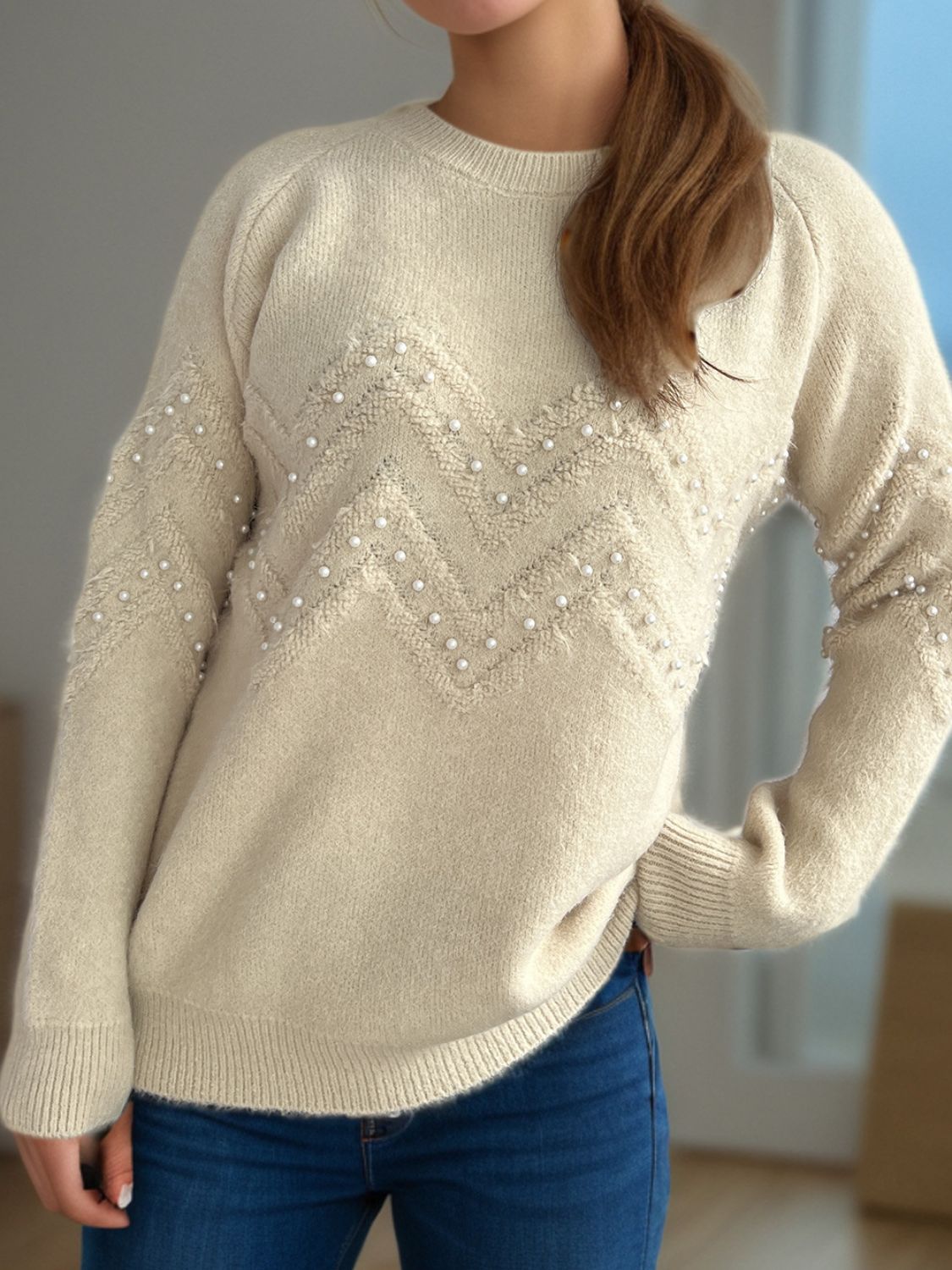 Eleganter Pullover mit Perlendetails