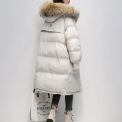 Lange Puffer Winterjacke mit Fell