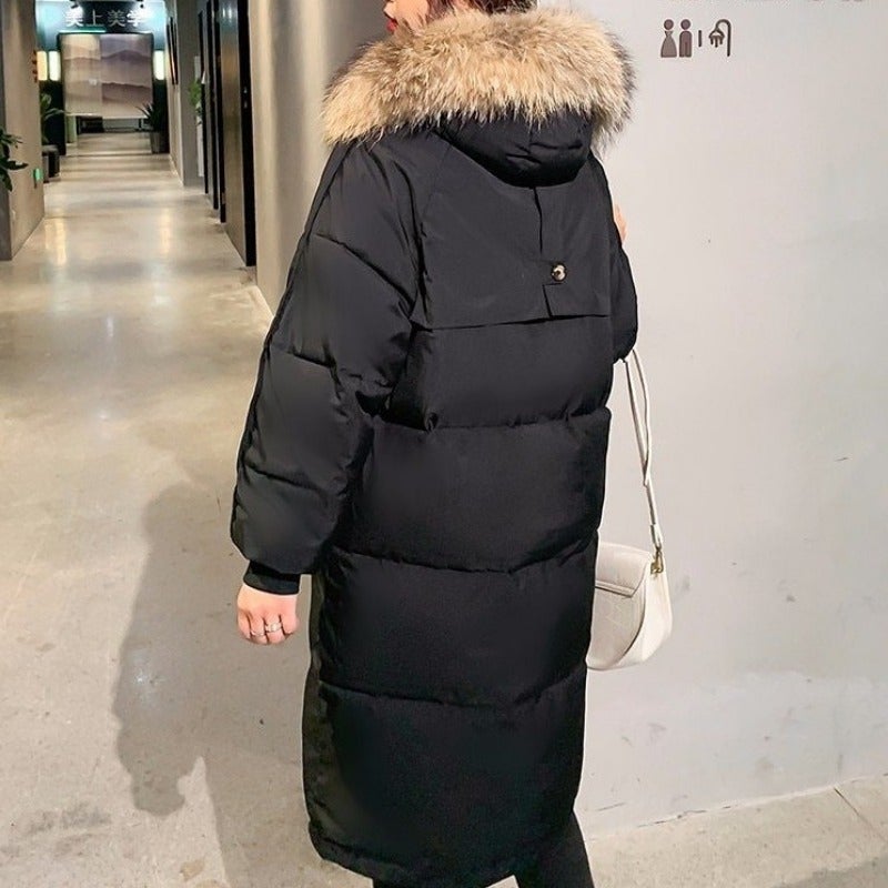 Lange Puffer Winterjacke mit Fell