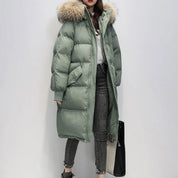 Lange Puffer Winterjacke mit Fell