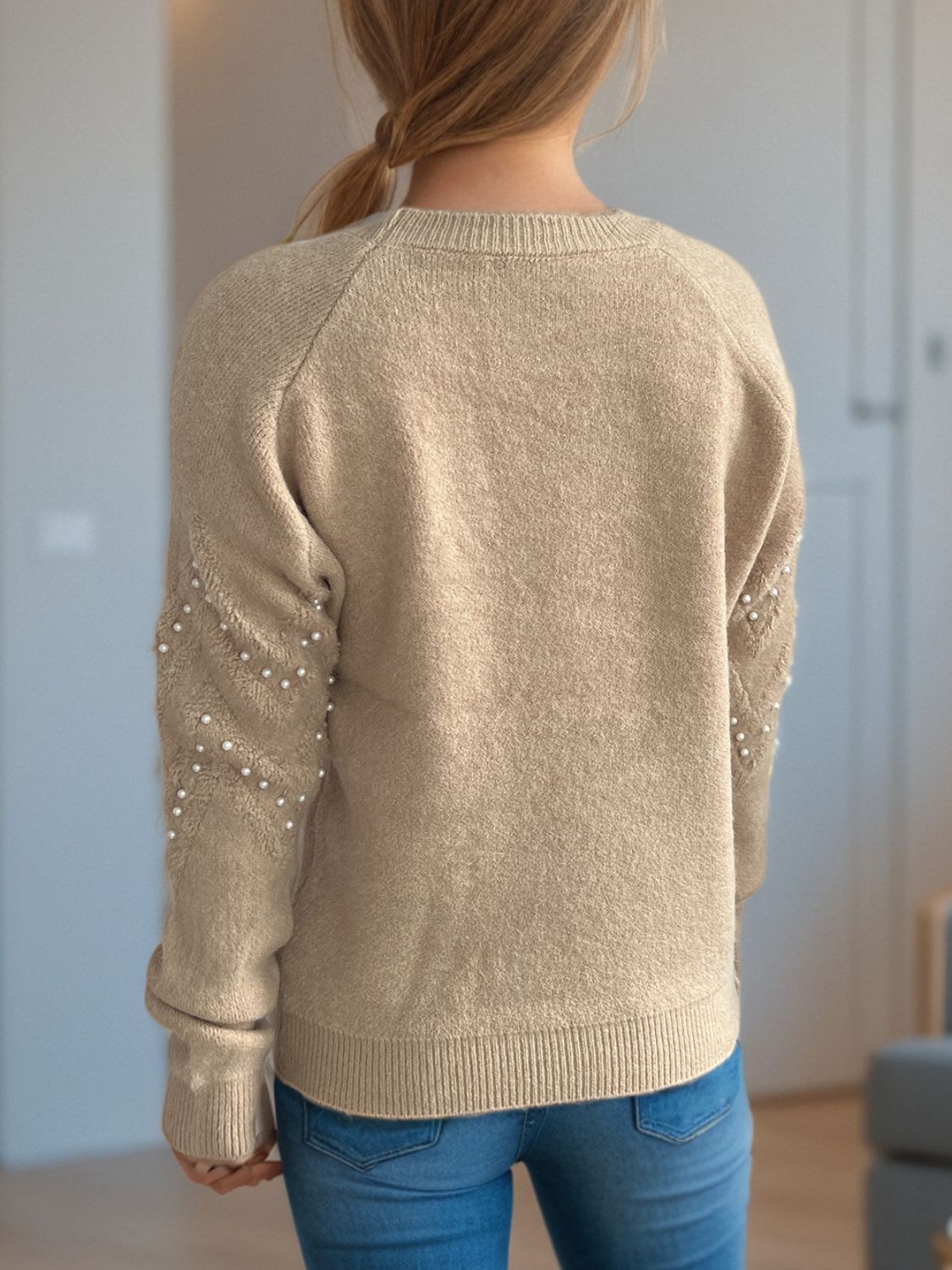 Eleganter Pullover mit Perlendetails